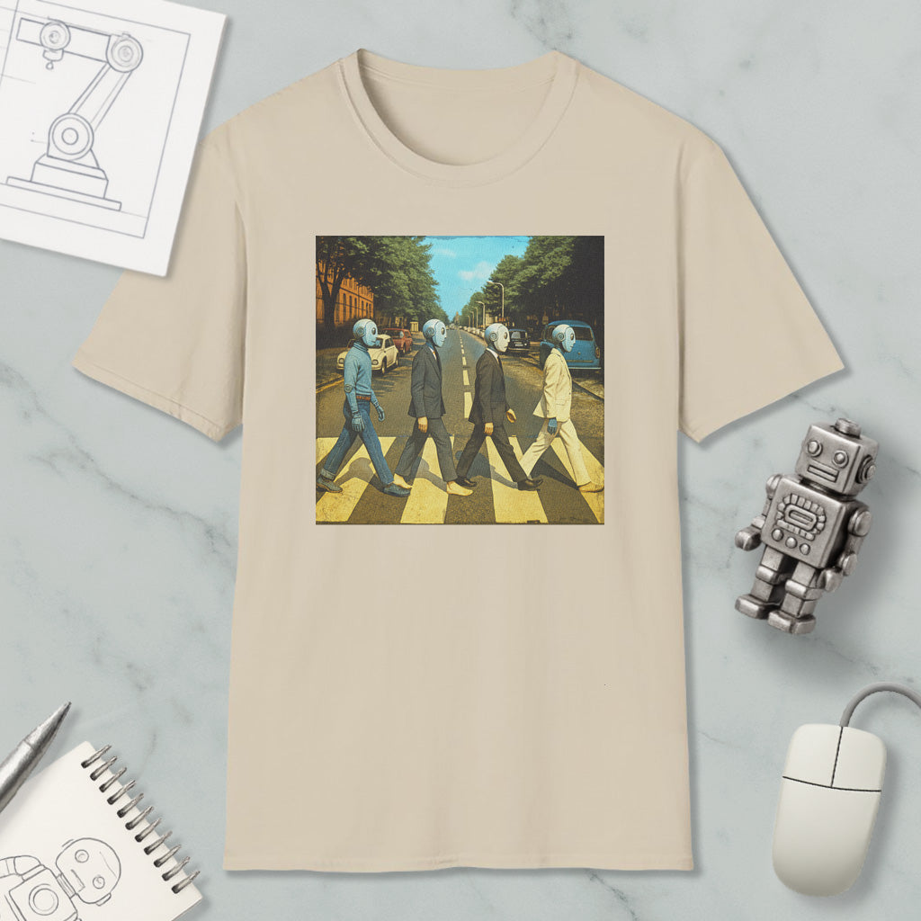 a t-shirt with a graphic design depicting four people walking on a crosswalk, with one person wearing a suit and tie.