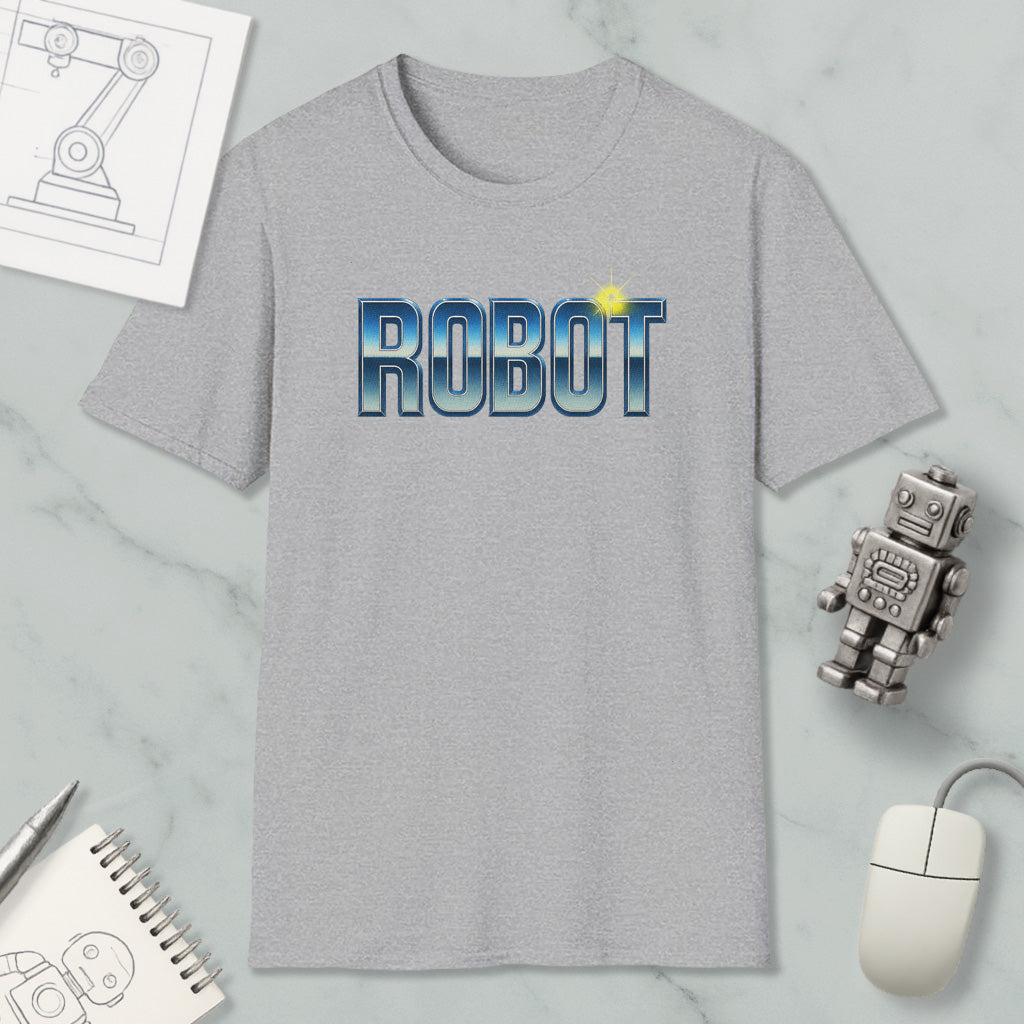 a gray t-shirt with the word "ROBOT" printed on it, along with a small robot figurine and a computer mouse.