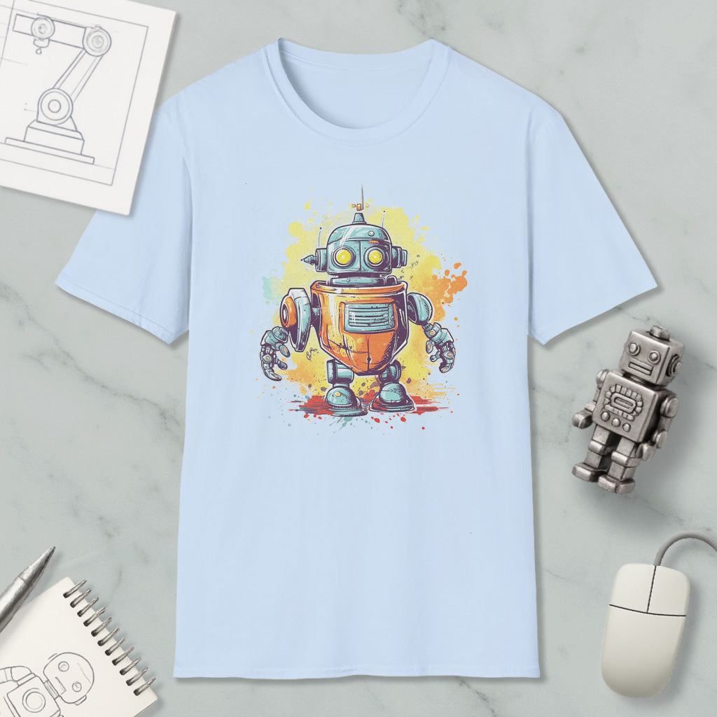 a light blue t-shirt with a colorful illustration of a robot, along with various objects such as a computer mouse, a notebook, and a pen.
