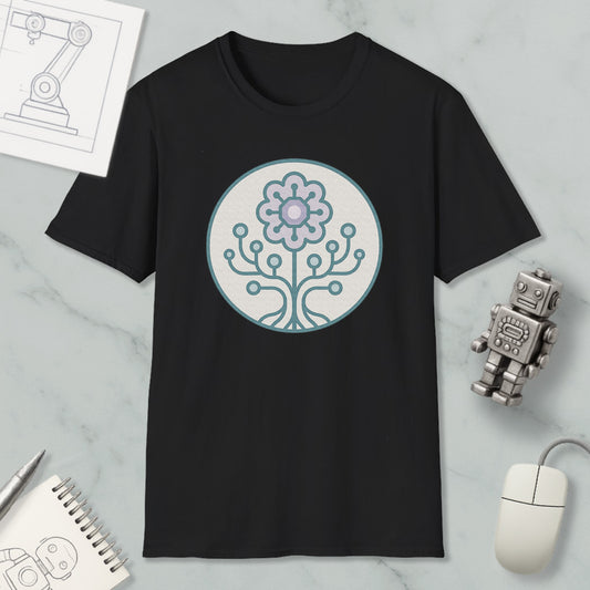 a black t-shirt with a graphic design of a flower and a tree on it, along with a computer mouse, a notebook, and a robot figurine.