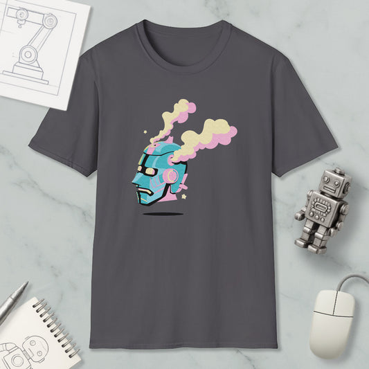 a gray t-shirt with a colorful graphic design, including a robot or robot-like figure with a face and smoke coming out of its head. The t-shirt is displayed on a marble surface, along with a computer mouse, a notepad, and a small robot figurine.