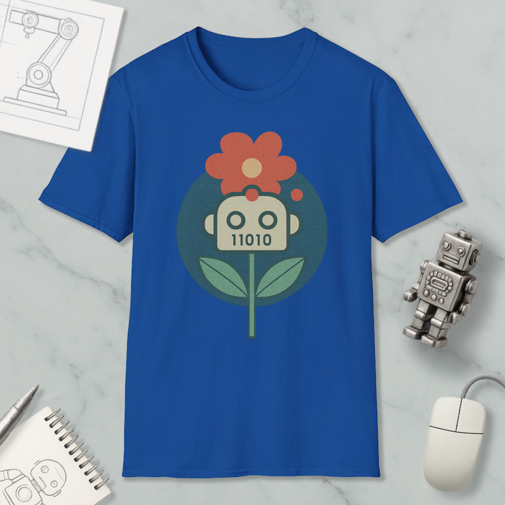 a blue t-shirt with a graphic design of a flower and a robot, along with various objects such as a computer mouse, a notebook, and a robot figurine.