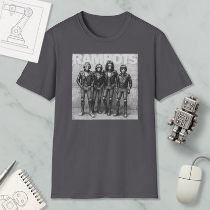 a gray t-shirt with a black and white photograph of four people, likely representing the members of a band, along with a computer mouse and other office supplies.
