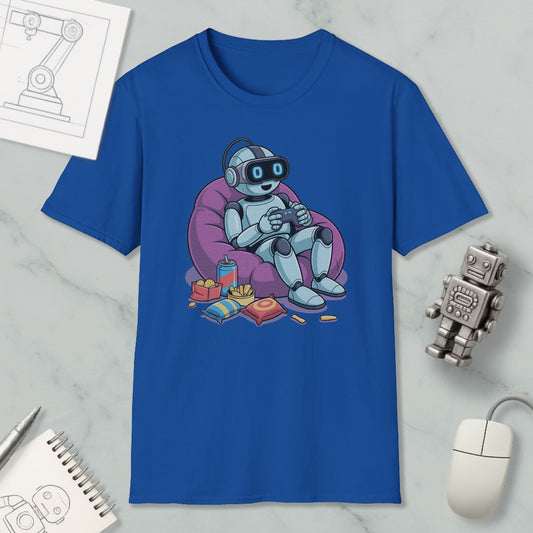 A blue t-shirt with a cartoon robot sitting in a bean bag chair, holding a remote control, surrounded by various objects such as a computer mouse, a notebook, and a toy robot.
