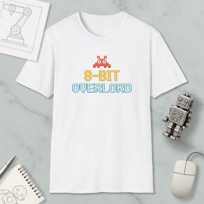 a white t-shirt with a graphic design, a computer mouse, a robot, and some technical drawings on a marble surface.