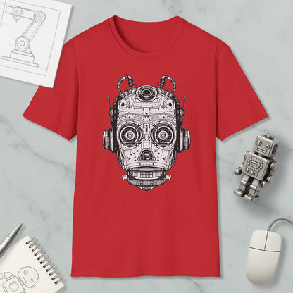 a red t-shirt with a black and white illustration of a robot or machine head, along with a computer mouse, a notebook, and a pen on a marble surface.