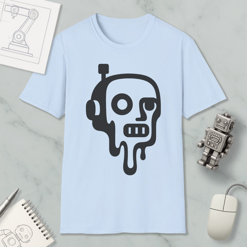 a light blue t-shirt with a black graphic design depicting a robot or robot-like figure with dripping or melting features. The t-shirt is placed on a marble surface, along with a small robot figurine and a computer mouse.