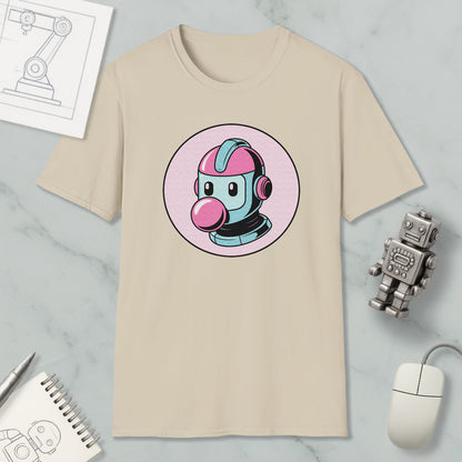a beige t-shirt with a cartoon robot design, along with various objects such as a computer mouse, a notebook, and a pen.