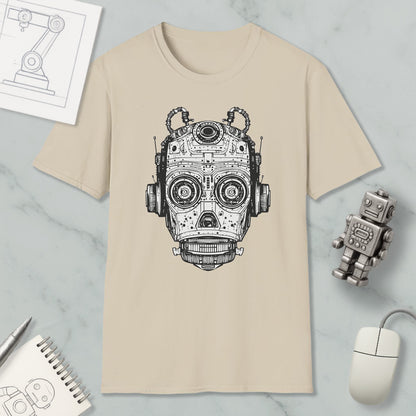 a beige t-shirt with a black and white illustration of a robot or machine head, along with various objects such as a computer mouse, a pen, and a notebook.