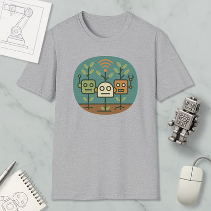a gray t-shirt with a graphic design of three cartoon robots, along with various office supplies and a computer mouse.