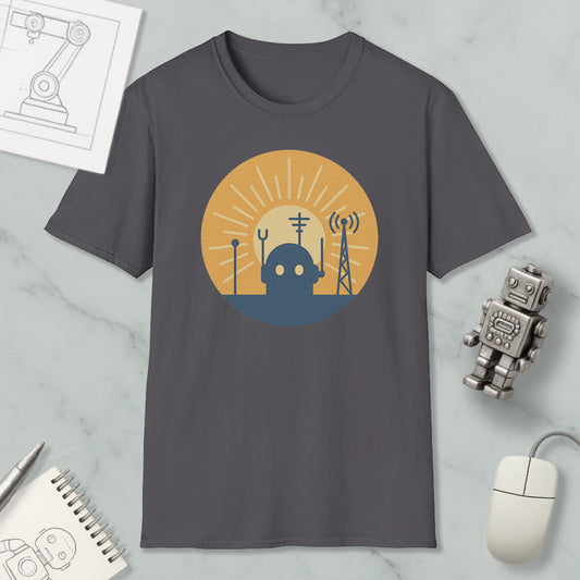 a gray t-shirt with a graphic design depicting a robot surrounded by various technological elements, such as a tower and a satellite dish, all set against a sun-like background.