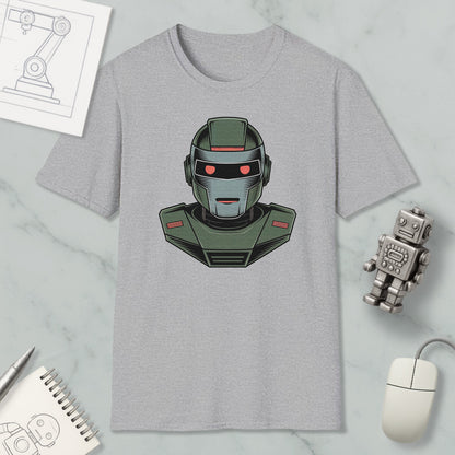 a gray t-shirt with a graphic of a robot or robot-like character, along with various objects such as a computer mouse, a notebook, and a pen.