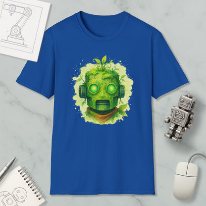 a blue t-shirt with a green robot-like face design, surrounded by various objects such as a computer mouse, a notebook, and a small robot figurine.