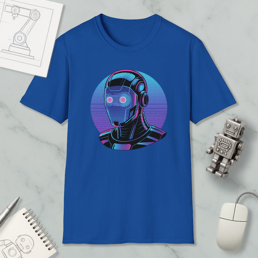a blue t-shirt with a graphic design of a robot or cyborg-like figure, along with various objects such as a computer mouse, a notebook, and a pen.