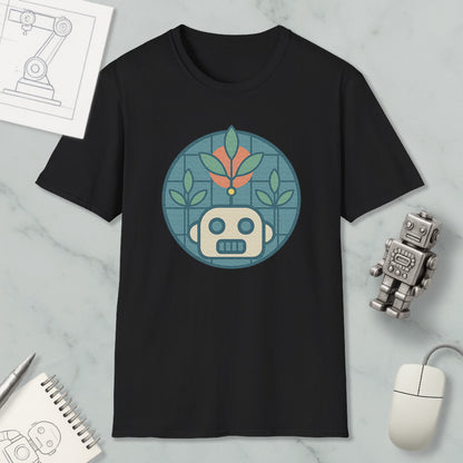 a black t-shirt with a graphic design of a robot and plants, along with a computer mouse and a notebook on a marble surface.
