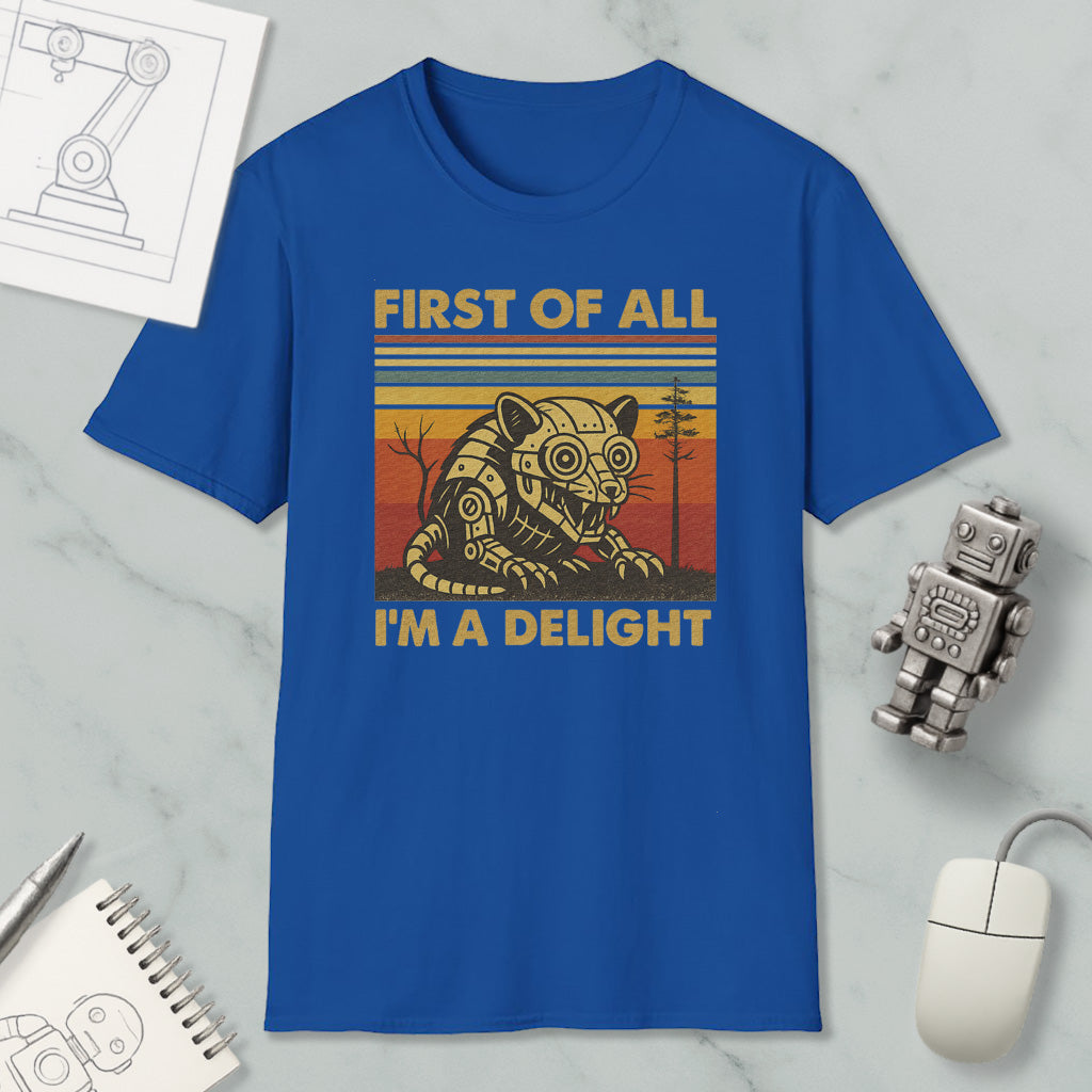 a blue t-shirt with a graphic design, a robot, and some other items on a marble surface.
