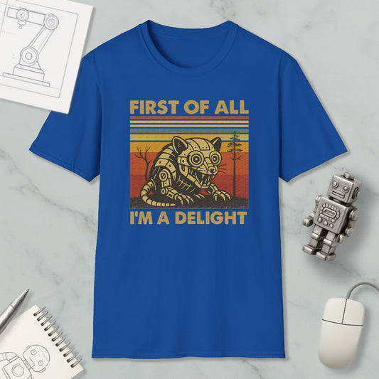 a blue t-shirt with a graphic design, a robot, and some other items on a marble surface.
