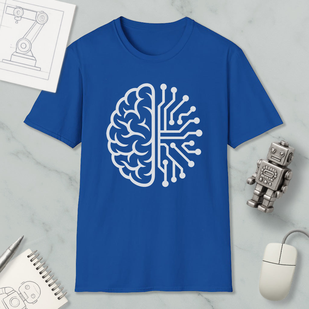 a blue t-shirt with a white graphic design depicting a brain and a circuit board, along with various objects such as a robot, a mouse, and a notebook.