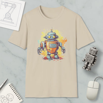 a beige t-shirt with a colorful illustration of a robot, along with various objects such as a computer mouse, a pen, and a notebook.