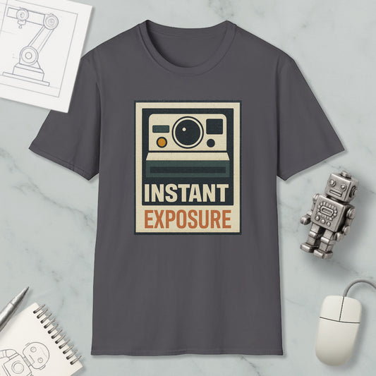 a gray t-shirt with a graphic design that says "INSTANT EXPOSURE" and a camera icon, along with a robot and a computer mouse.