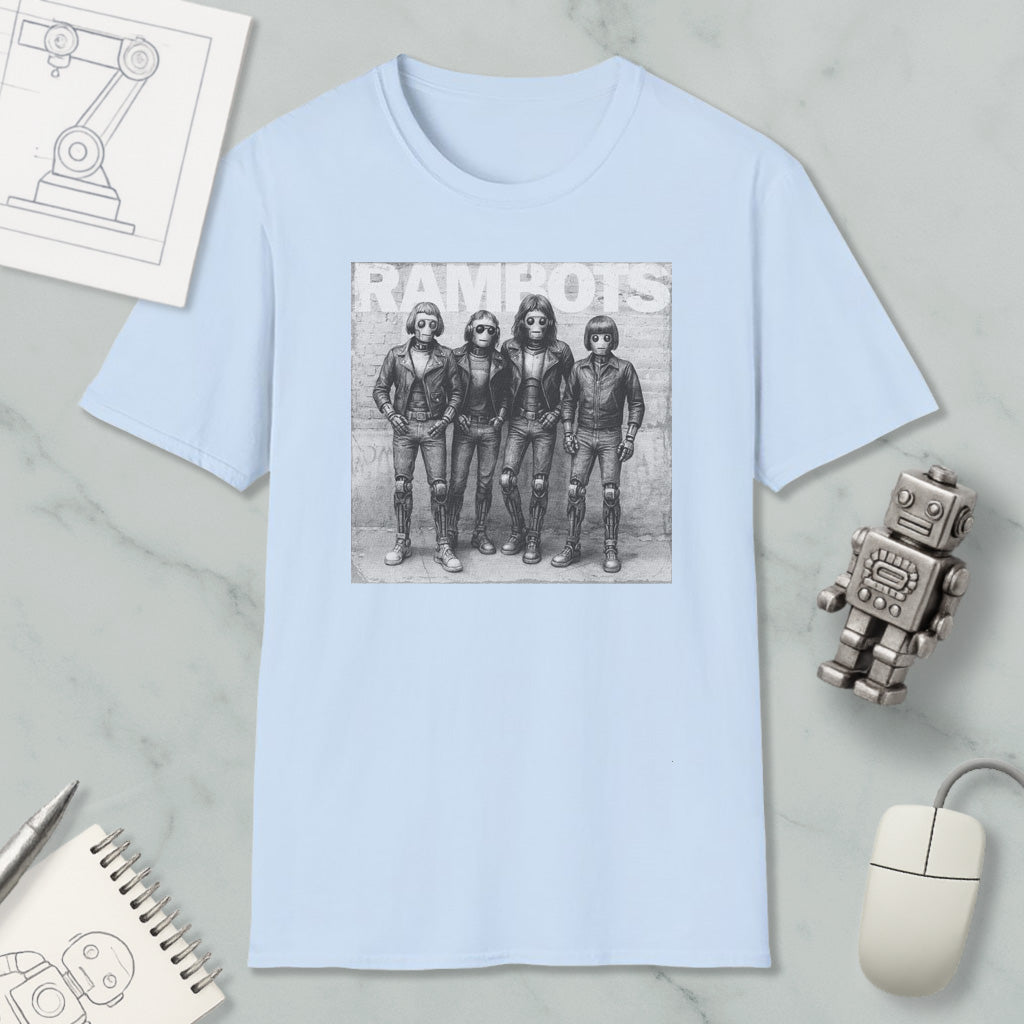 a light blue t-shirt with a black and white graphic of four people, along with a computer mouse and a notebook.