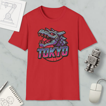 a red t-shirt with a graphic of a dragon or robot head, along with a computer mouse and other office supplies.