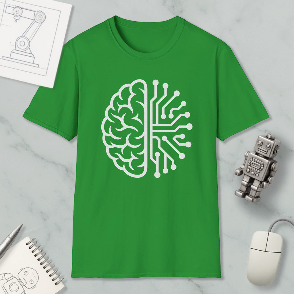 a green t-shirt with a white graphic design depicting a brain and circuit board, along with various objects such as a computer mouse, a robot, and a notebook.