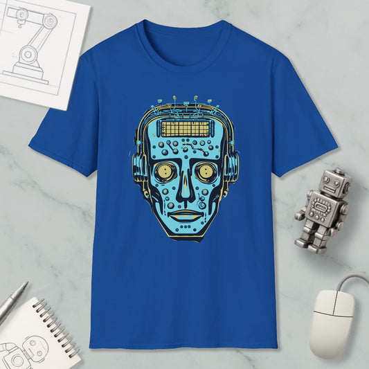 a blue t-shirt with a graphic design of a robot or humanoid face, along with various objects such as a computer mouse, a notebook, and a pen.