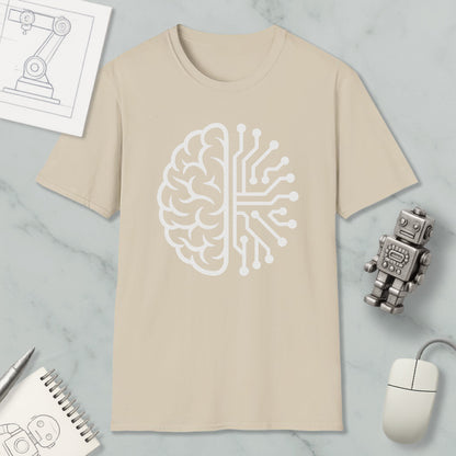 a beige t-shirt with a white graphic design depicting a brain and a circuit board, along with various objects such as a robot, a mouse, and a notebook.