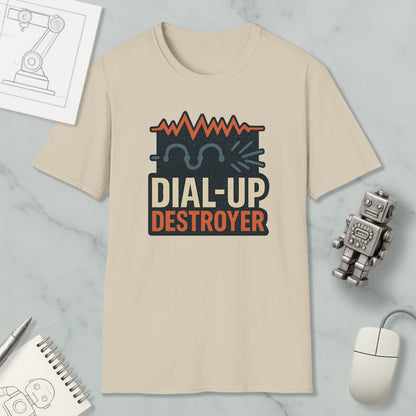 a beige t-shirt with a graphic design, a computer mouse, a robot, and some papers on a marble surface.