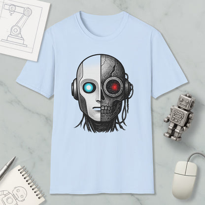 a light blue t-shirt with a graphic design depicting a robot or cyborg head with a skull-like face, surrounded by various objects such as a computer mouse, a notebook, and a robot toy.
