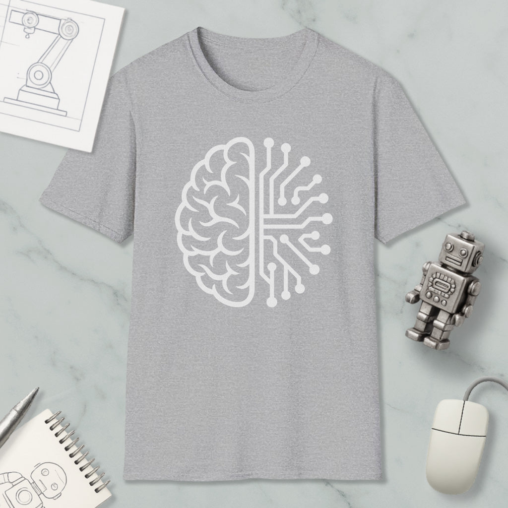 a gray t-shirt with a white graphic design depicting a brain and a circuit board, along with various objects such as a robot, a mouse, and a notebook.