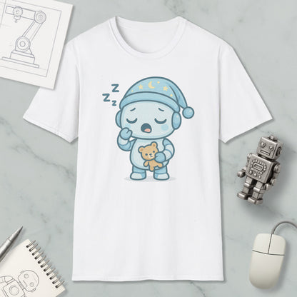 A white t-shirt with a cartoon robot wearing a blue hat and holding a teddy bear, along with a computer mouse and a notebook.
