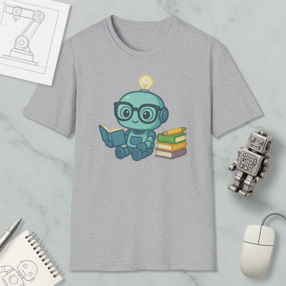 A gray t-shirt with a cartoon robot holding a book and a light bulb on its head, surrounded by books and a computer mouse.