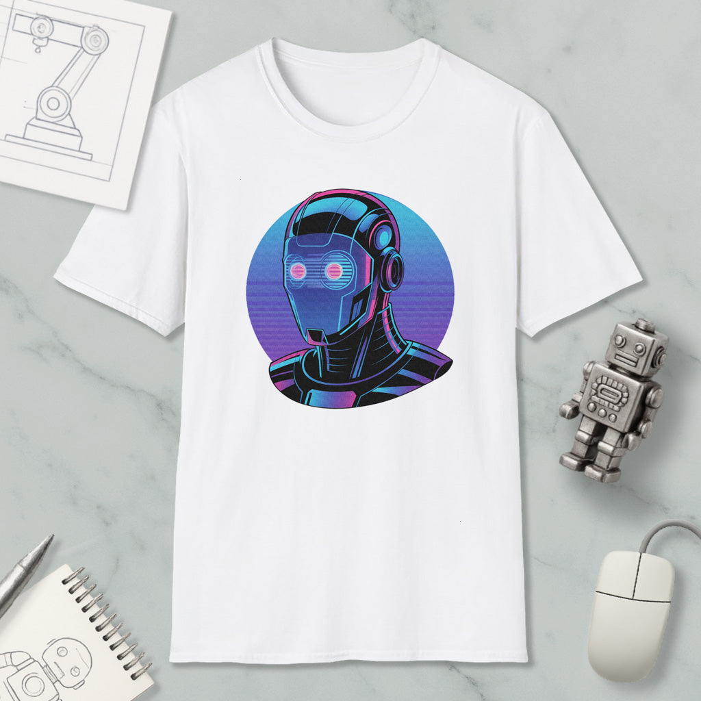 a white t-shirt with a graphic design of a robot or cyborg head, surrounded by various objects such as a computer mouse, a notebook, and a pen.