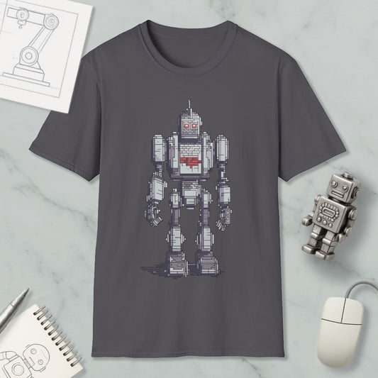 a gray t-shirt with a pixelated robot design, along with a computer mouse, a notepad, and a pen on a marble surface.