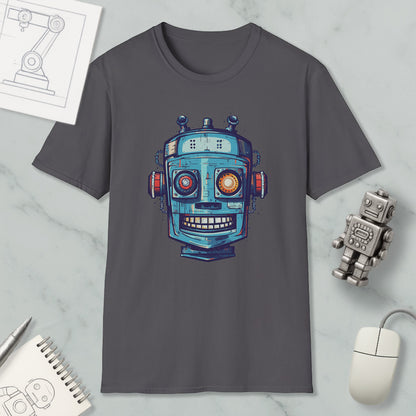 a gray t-shirt with a colorful robot graphic printed on it, along with a small robot toy and a computer mouse.