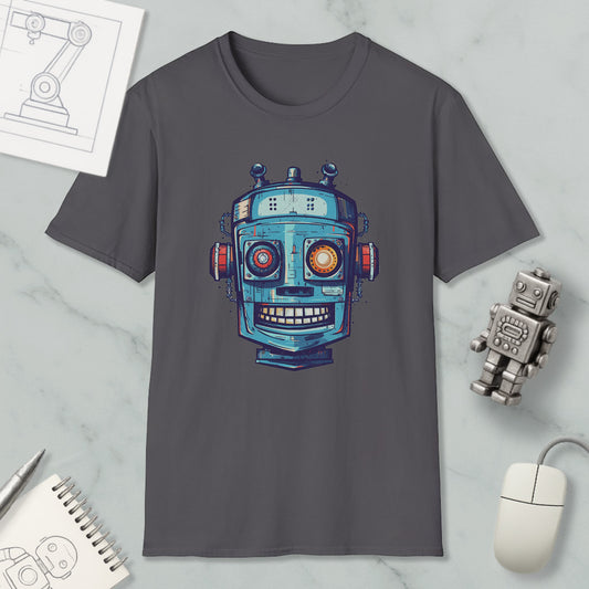 a gray t-shirt with a colorful robot graphic printed on it, along with a small robot toy and a computer mouse.