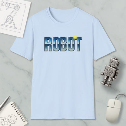 a light blue t-shirt with the word "ROBOT" printed on it, along with a small robot figurine and some other items such as a notebook and a computer mouse.