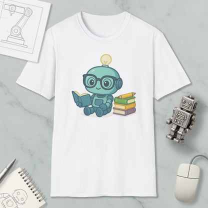 A white t-shirt with a cartoon robot holding a book and a light bulb on its head, surrounded by books and a computer mouse.