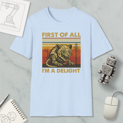 a light blue t-shirt with a graphic design of a robot or mechanical figure, along with the text "FIRST OF ALL I'M A DELIGHT". The t-shirt is displayed on a marble surface, and there are various objects such as a computer mouse, a pen, and a notebook nearby.