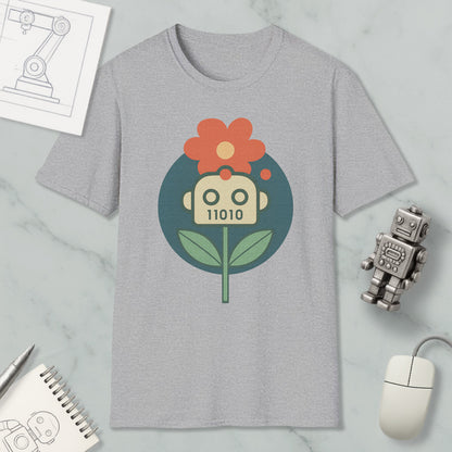 a gray t-shirt with a graphic design of a flower and a robot, along with various objects such as a computer mouse, a notebook, and a robot figurine.