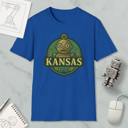 a blue t-shirt with a graphic of a robot and the word "KANSAS" printed on it, along with a small robot figurine and a computer mouse.