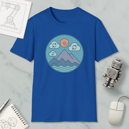 a blue t-shirt with a graphic design of mountains, clouds, and a sun, along with a robot and a computer mouse.
