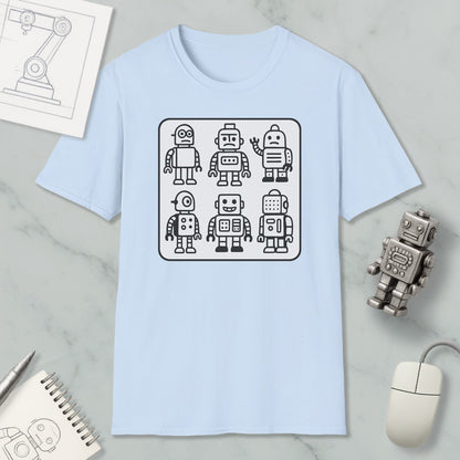 a light blue t-shirt with a graphic design of six cartoon-style robots, along with various objects such as a computer mouse, a notebook, and a pen.