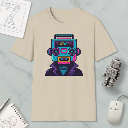 a beige t-shirt with a colorful graphic of a robot or robot-like figure, along with various objects such as a mouse, a notebook, and a pen.