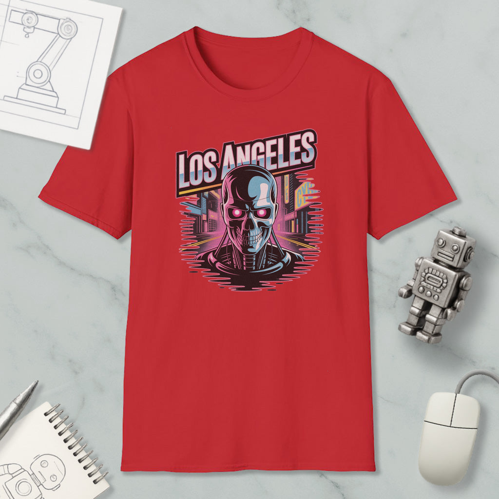 a red t-shirt with a graphic design of a skull and cityscape, along with various office supplies and a computer mouse.