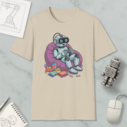 A t-shirt with a cartoon robot sitting in a bean bag chair, holding a game controller, surrounded by snacks and a toy robot.