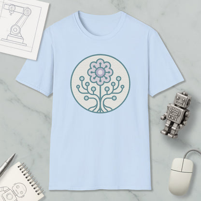 a light blue t-shirt with a circular design on it, surrounded by various objects such as a computer mouse, a robot, and a notebook.