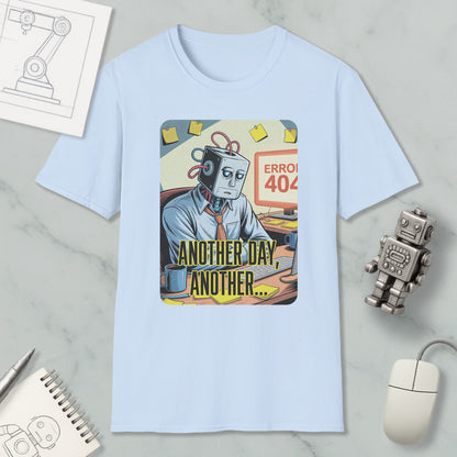 A light blue t-shirt with a graphic design depicting a robot character with a sad expression, surrounded by various objects such as a computer mouse, a pen, and a notebook.